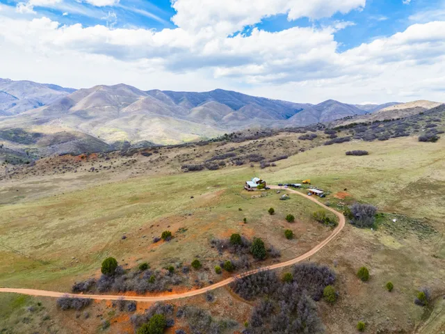 Overview of rural landscape with a mountain backdrop