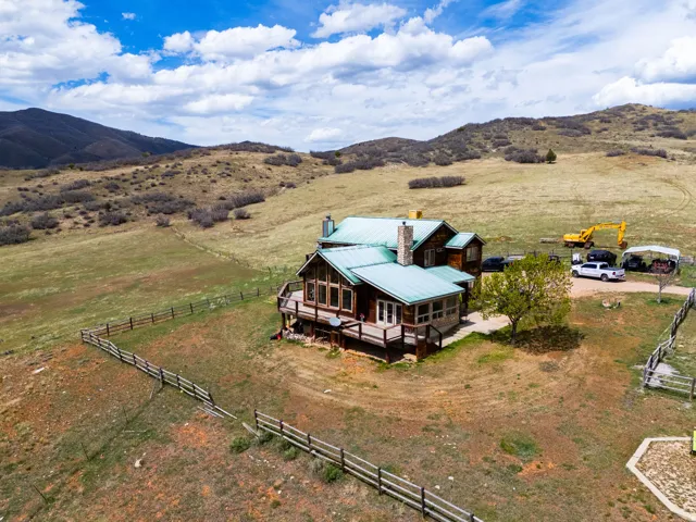 Overview of rural landscape featuring a mountainous background