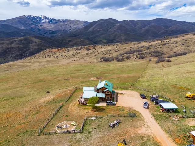 Aerial view of sparsely populated area with a mountainous background