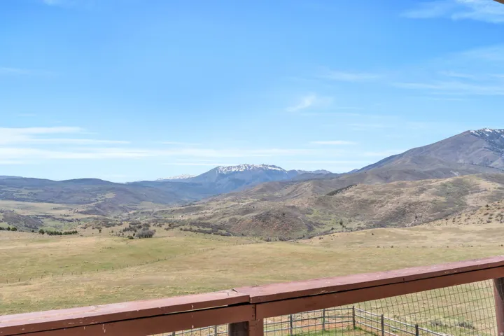 View of mountain background featuring rural landscape