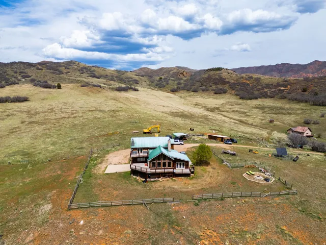 Overview of rural landscape featuring a mountainous background