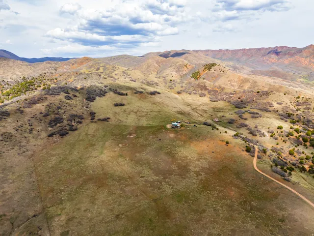 View of rural area with a mountain backdrop