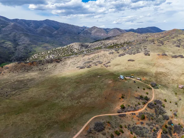 Overview of rural landscape with a mountainous background