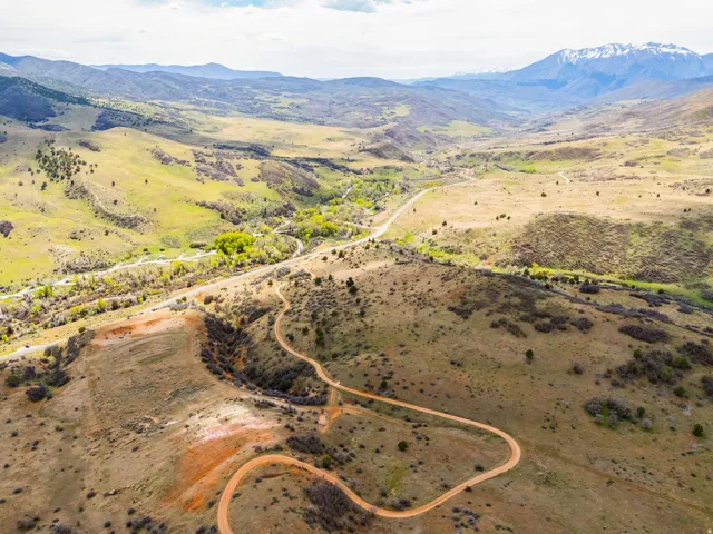Overview of rural landscape with a mountainous background