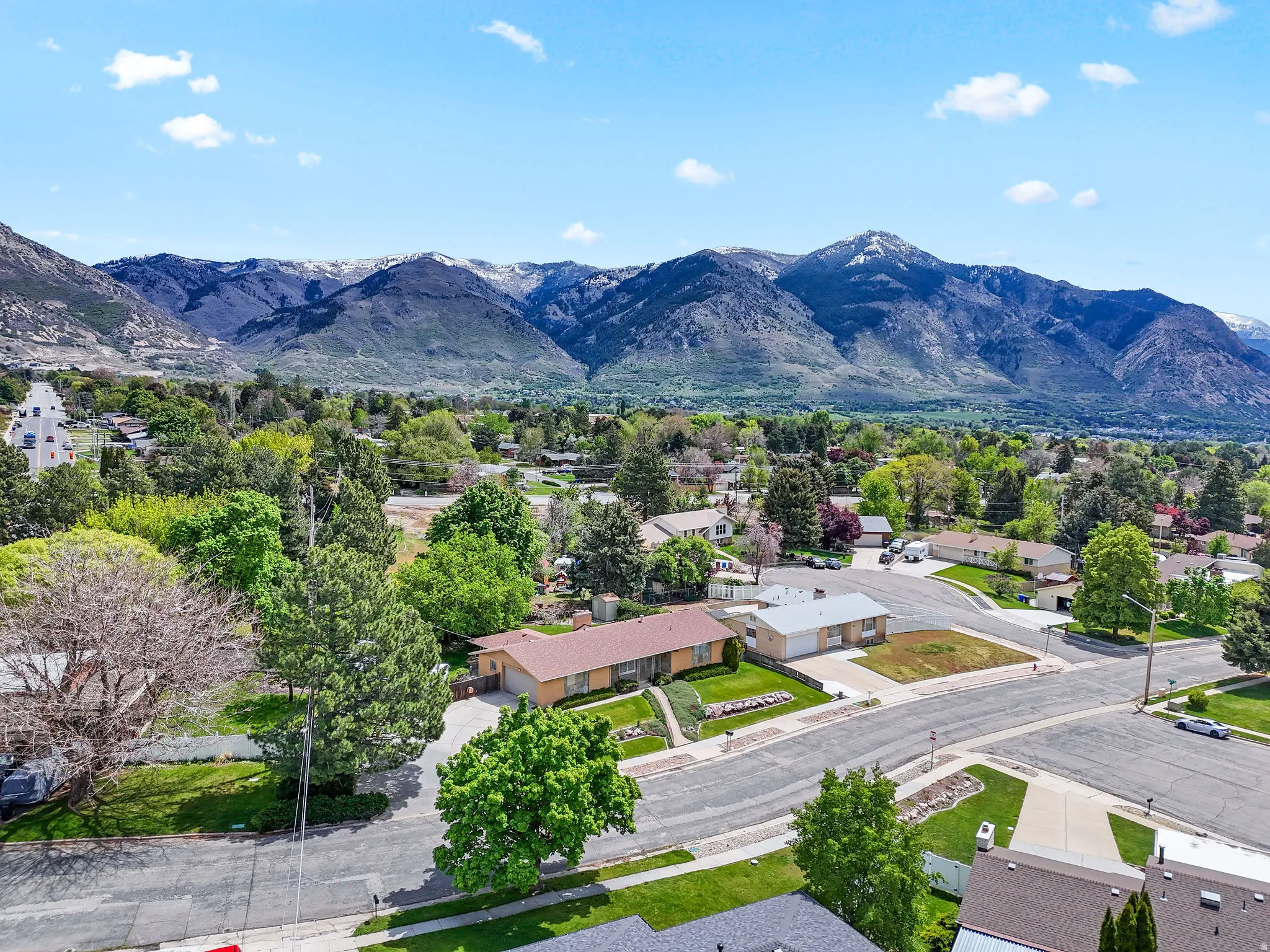 Aerial perspective of suburban area with mountains