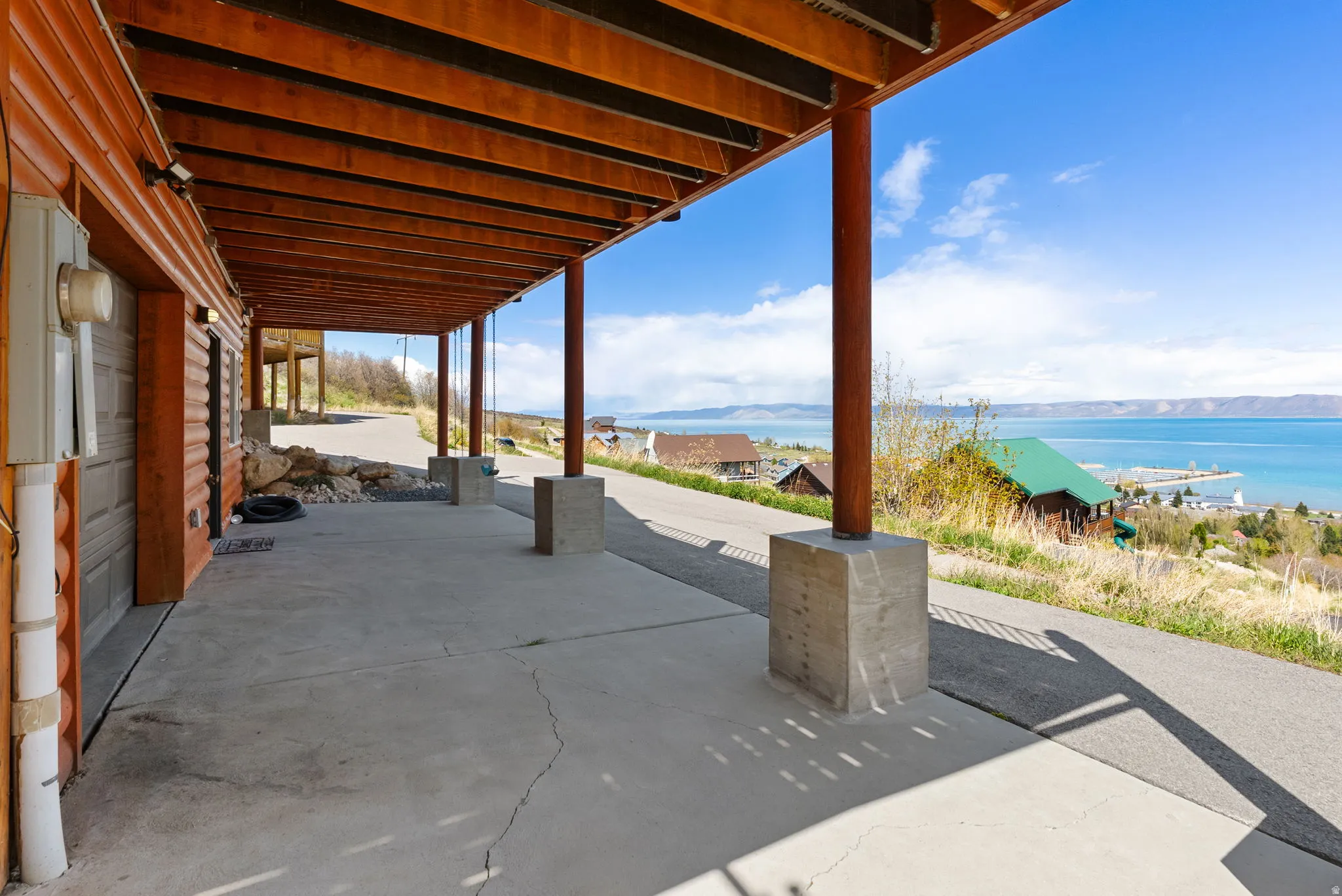 View of patio / terrace featuring a water view