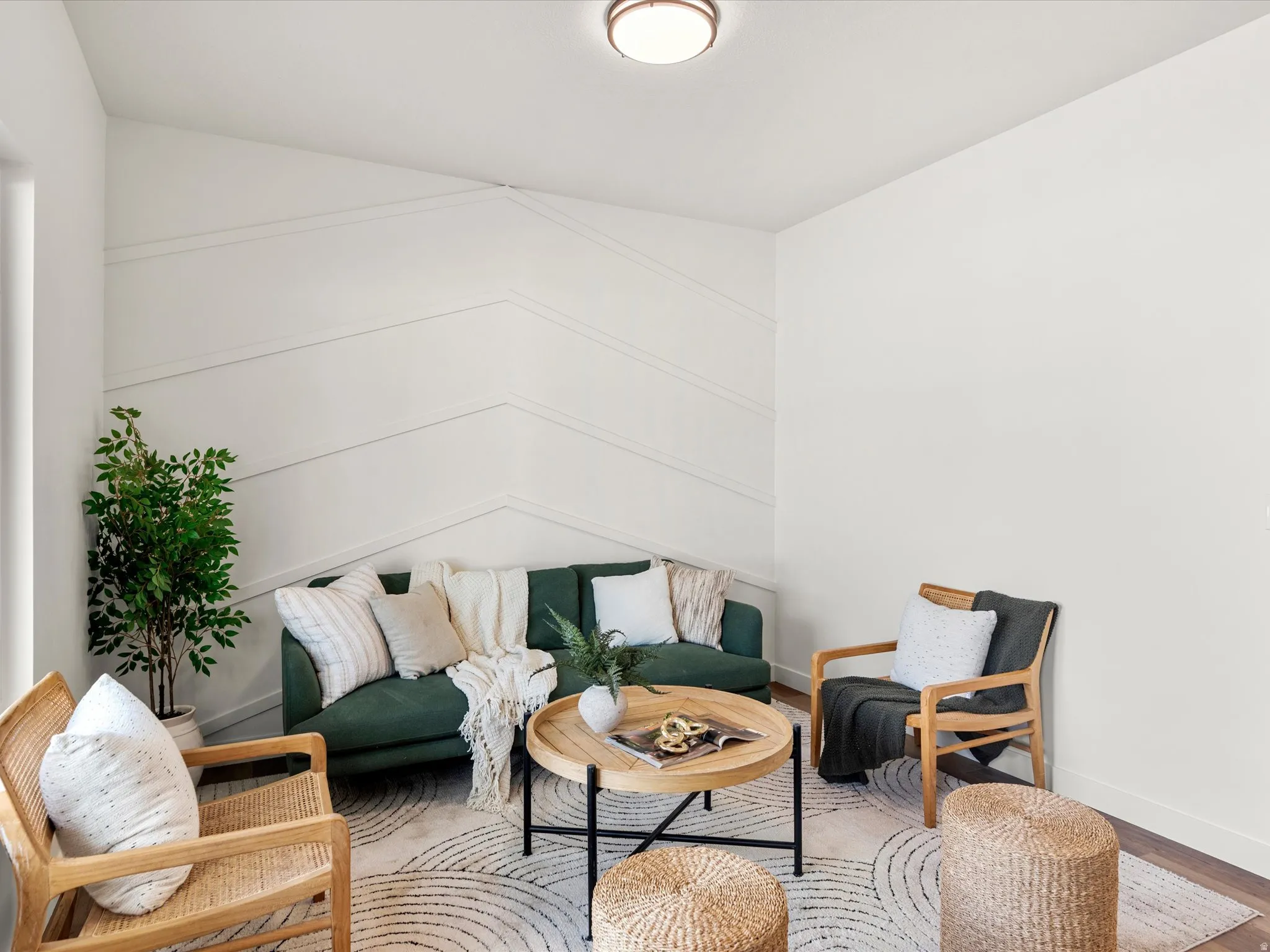 Living room featuring baseboards and wood finished floors