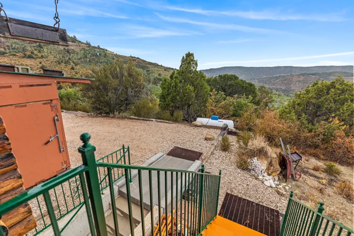 View of yard featuring a mountain view and a patio area
