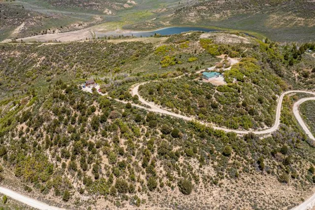 View of rural area featuring a nearby body of water