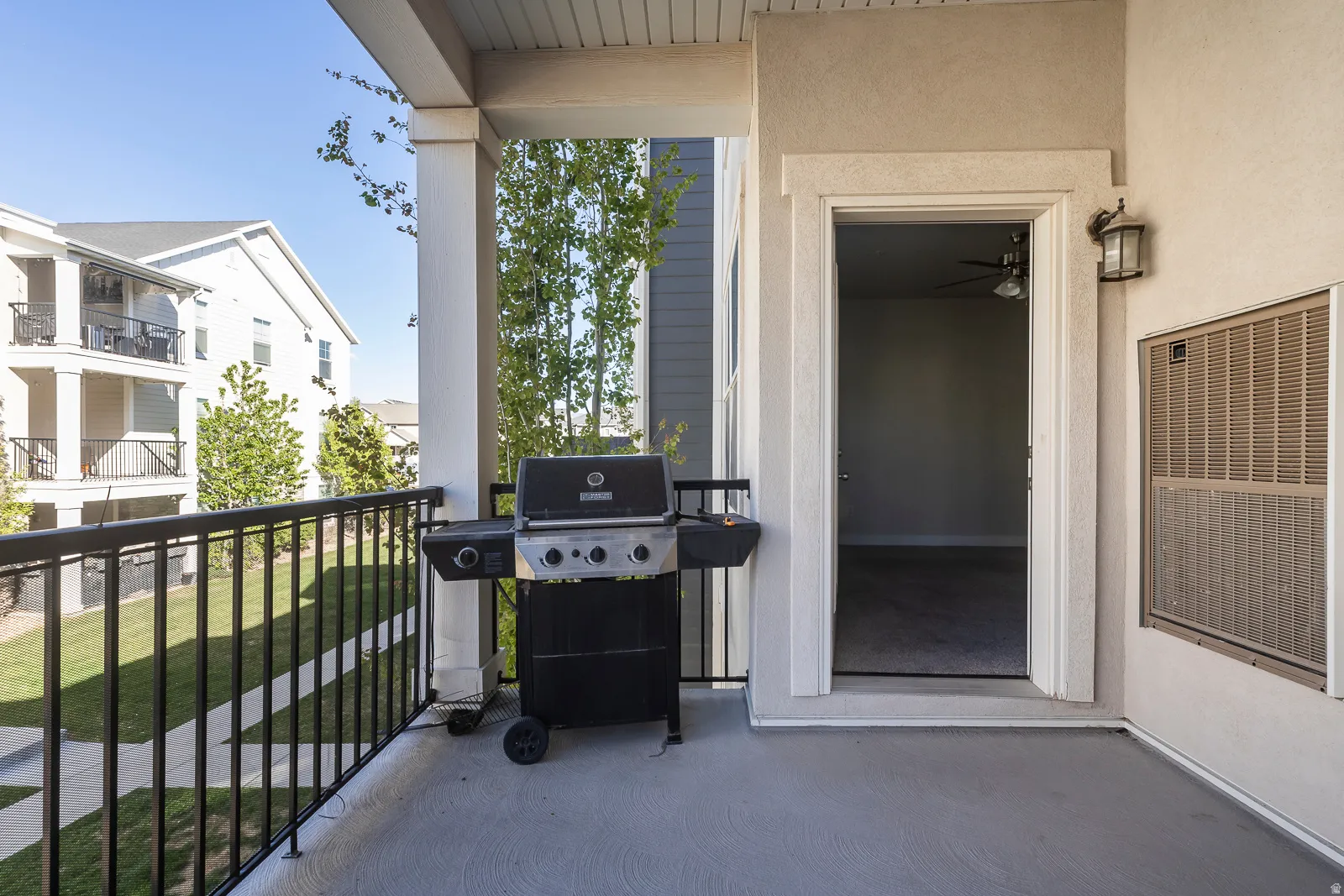 Balcony featuring a grill