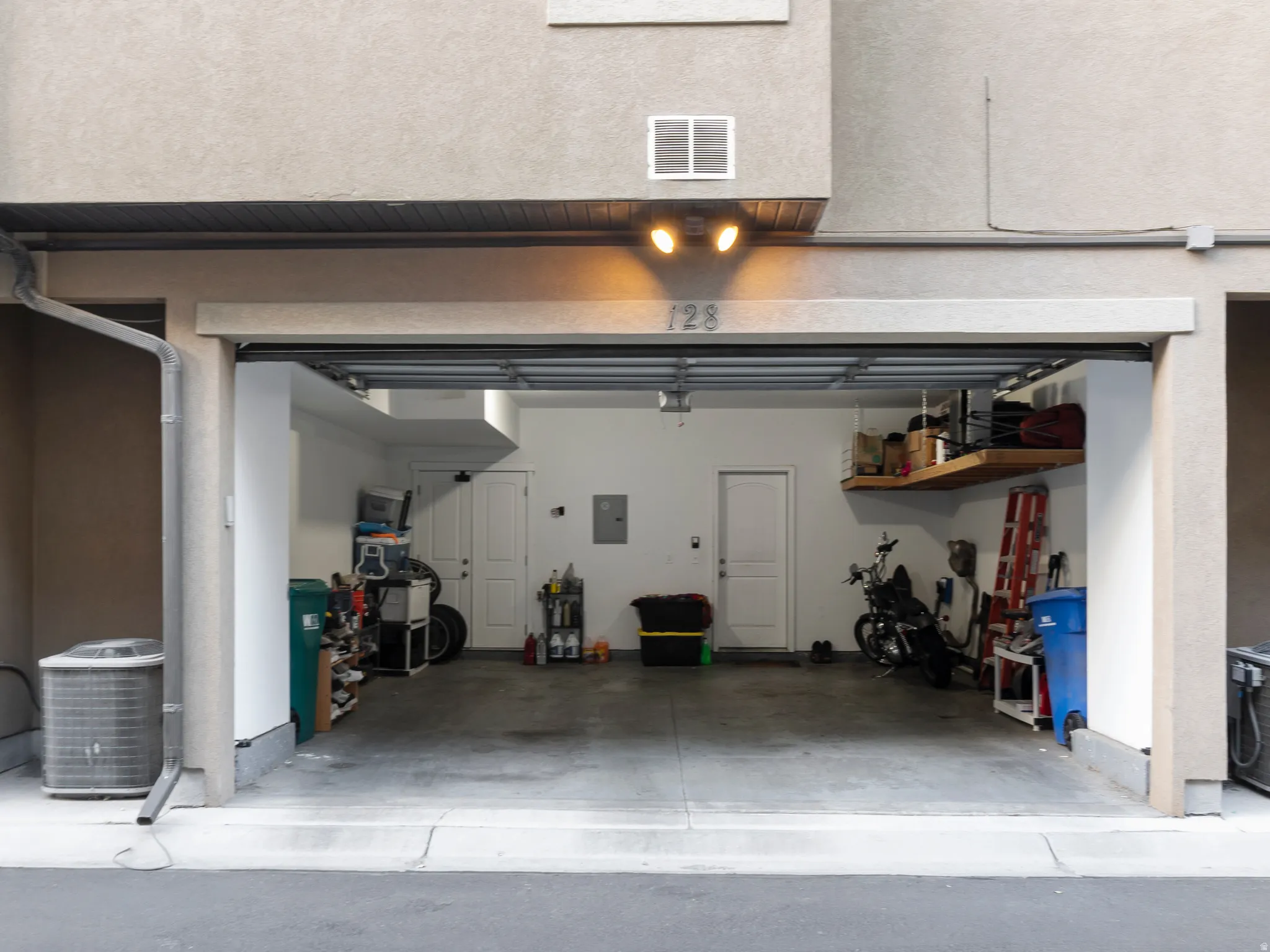 Garage featuring electric panel