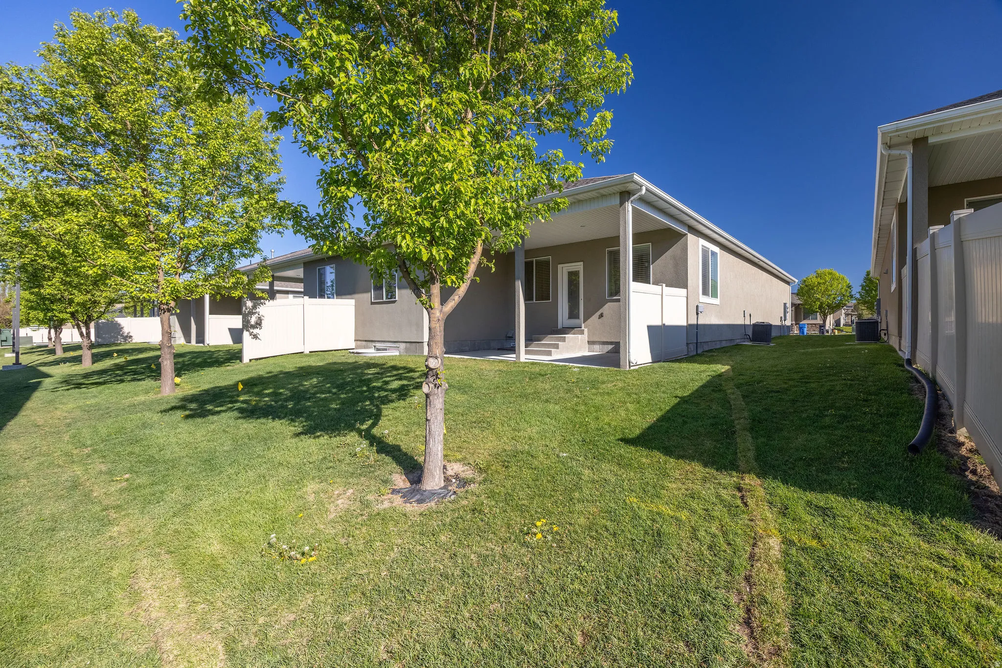 Rear view of house with a patio area
