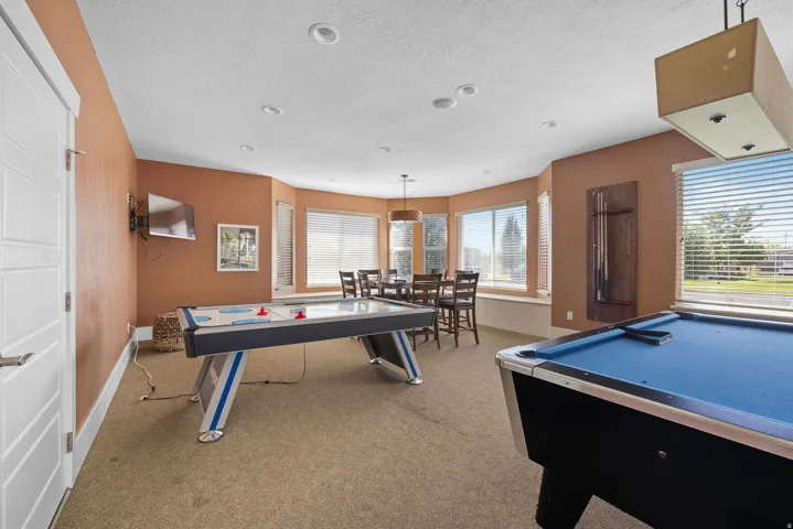 Clubhouse Rec room with pool table, ping pong tables & air hockey