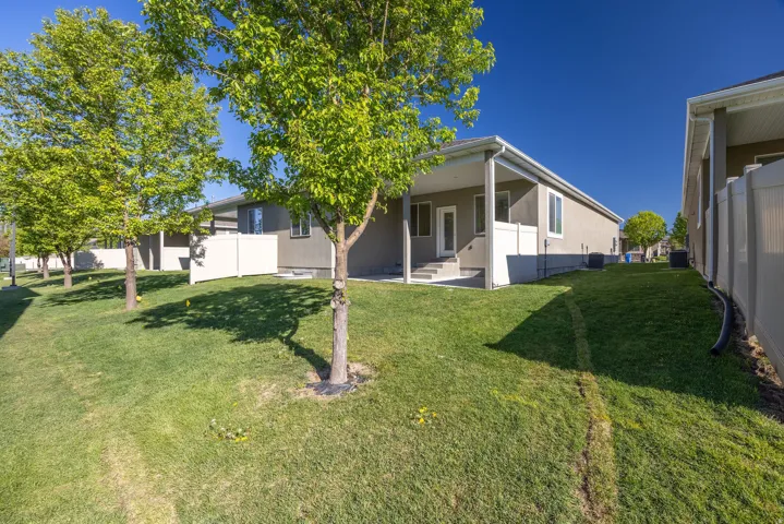 Rear view of house with a patio area