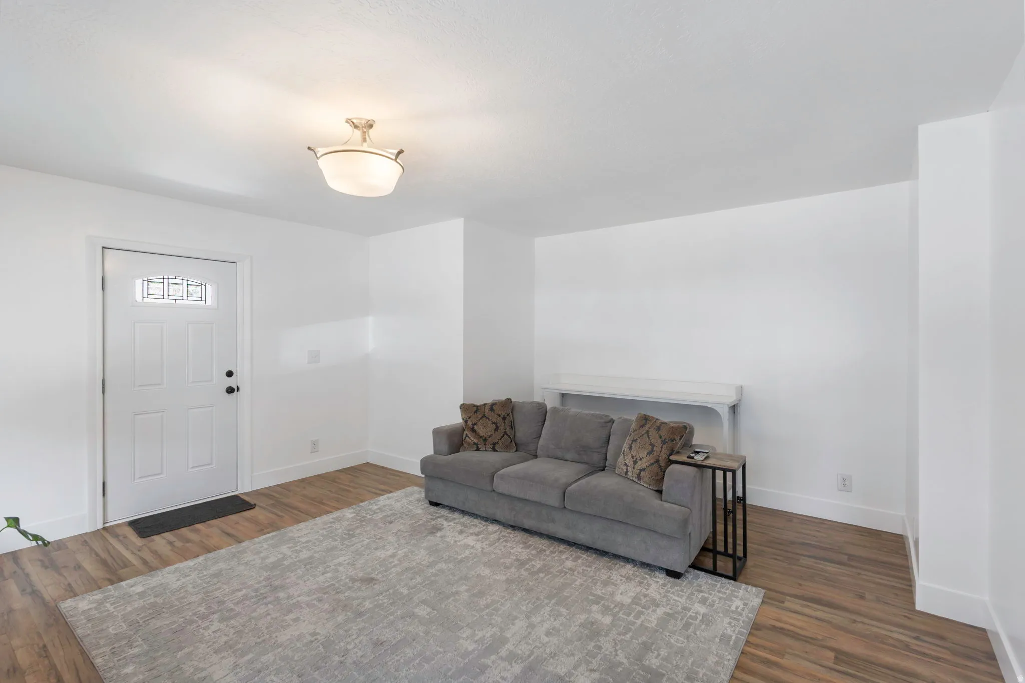 Living room with dark wood finished floors