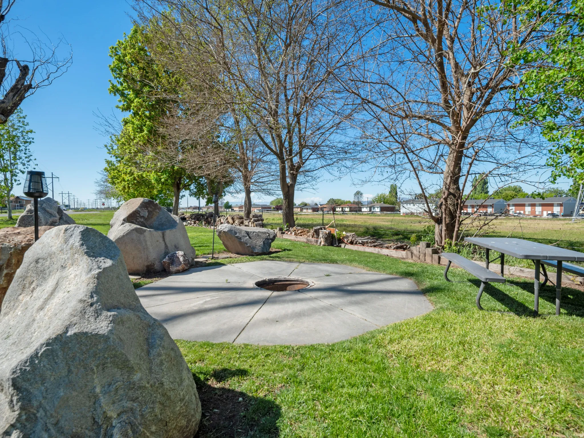 View of home's community featuring basketball hoop