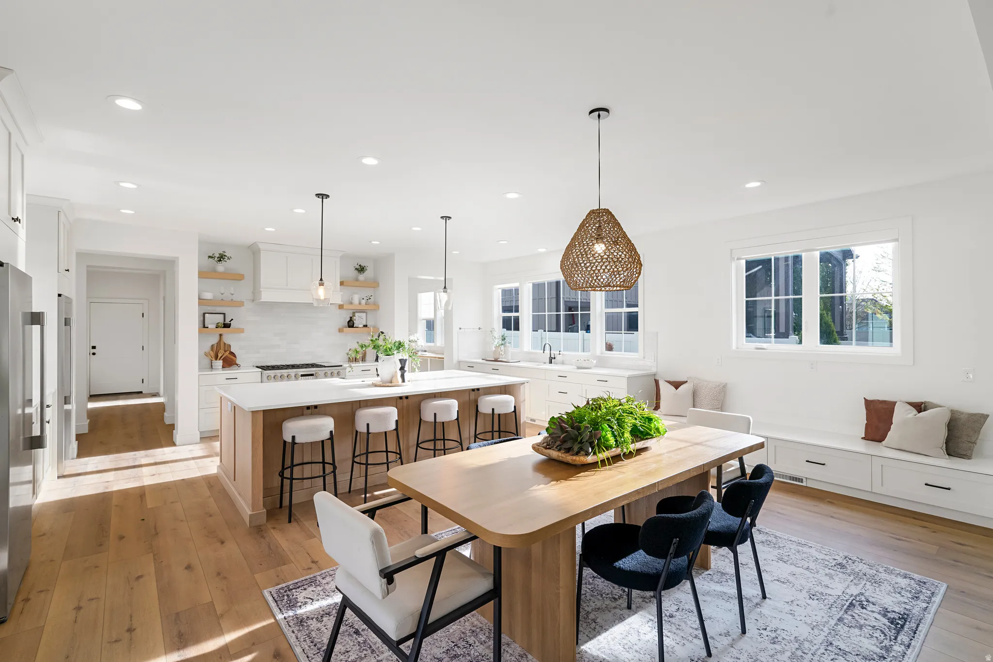 Dining space featuring light wood-type flooring and recessed lighting