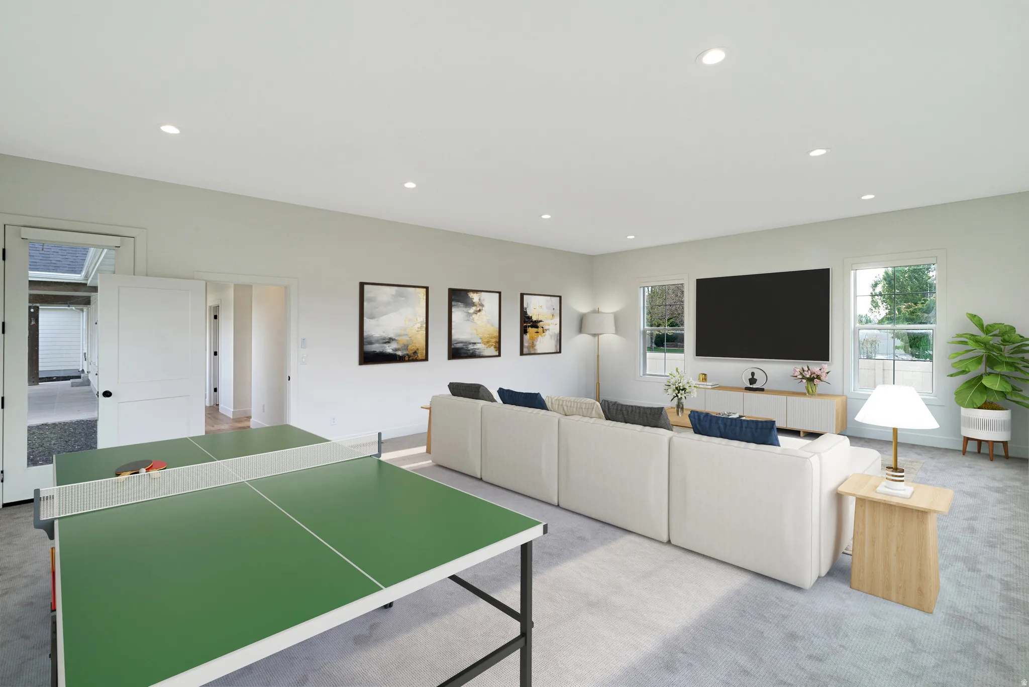 Carpeted living area featuring recessed lighting