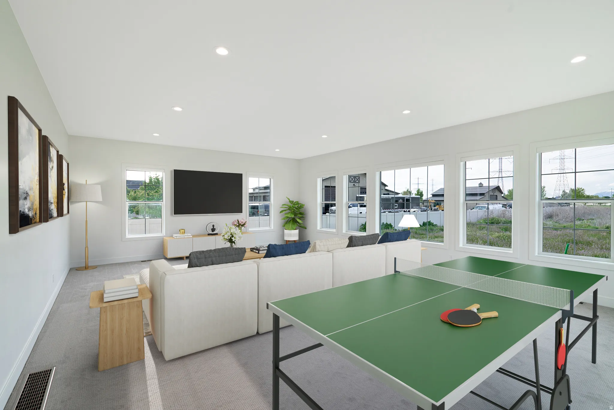 Recreation room featuring recessed lighting and light colored carpet