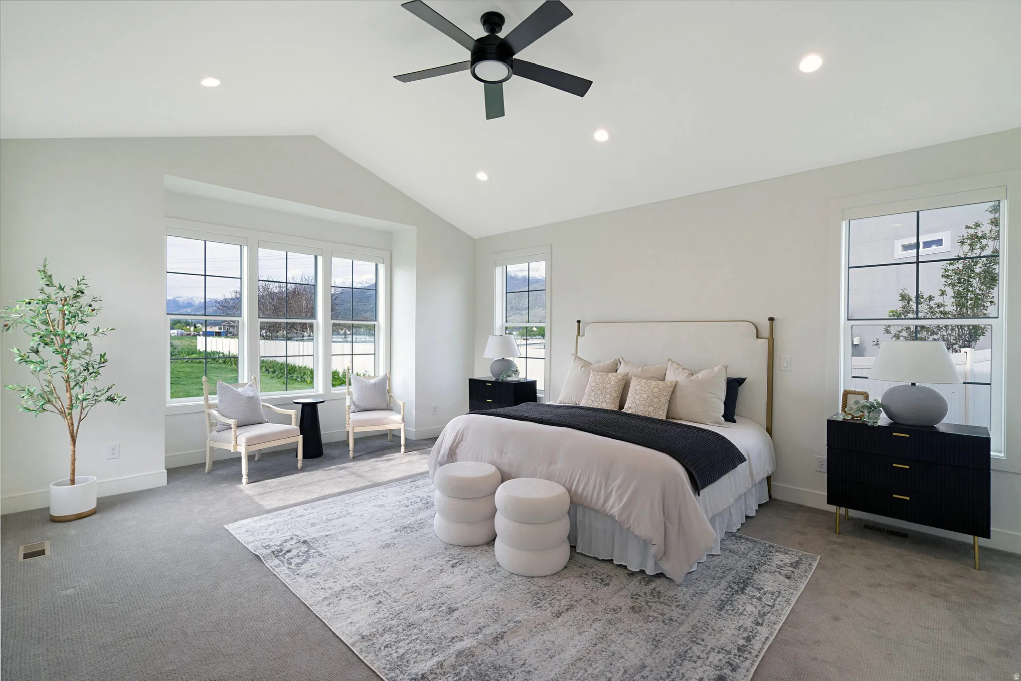 Bedroom with carpet floors, a ceiling fan, and recessed lighting