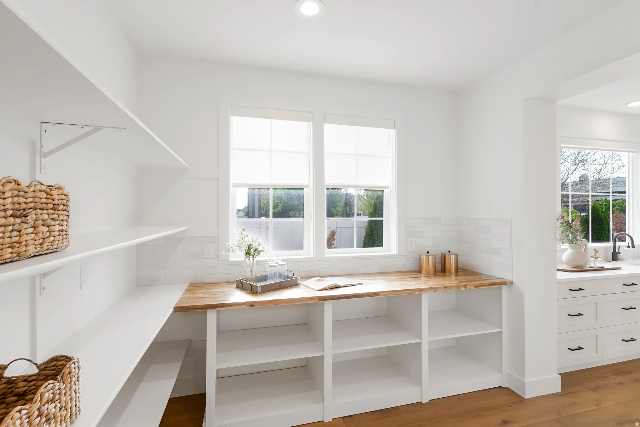 Pantry featuring a sink