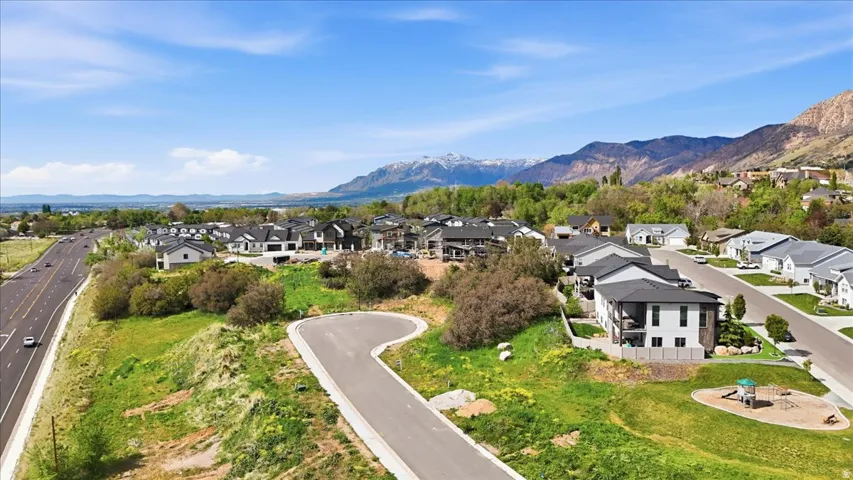 Aerial perspective of suburban area featuring mountains