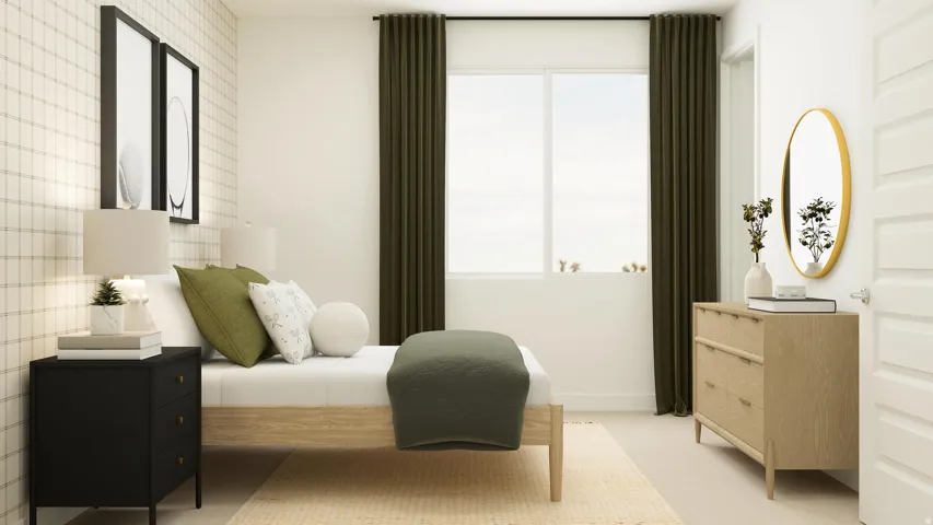 Bedroom with baseboards and light colored carpet