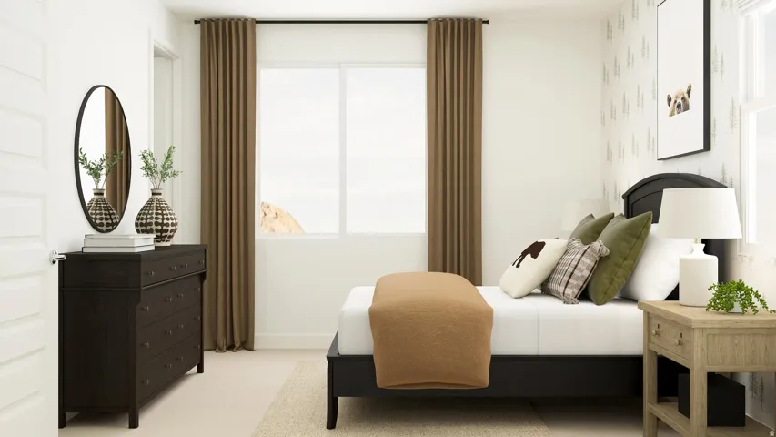 Bedroom featuring light colored carpet