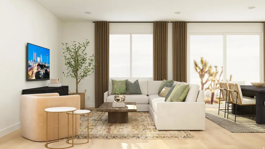 Living room with wood finished floors and baseboards