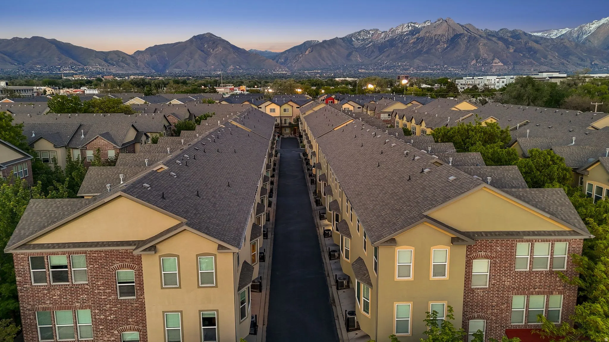 Aerial perspective of suburban area with mountains