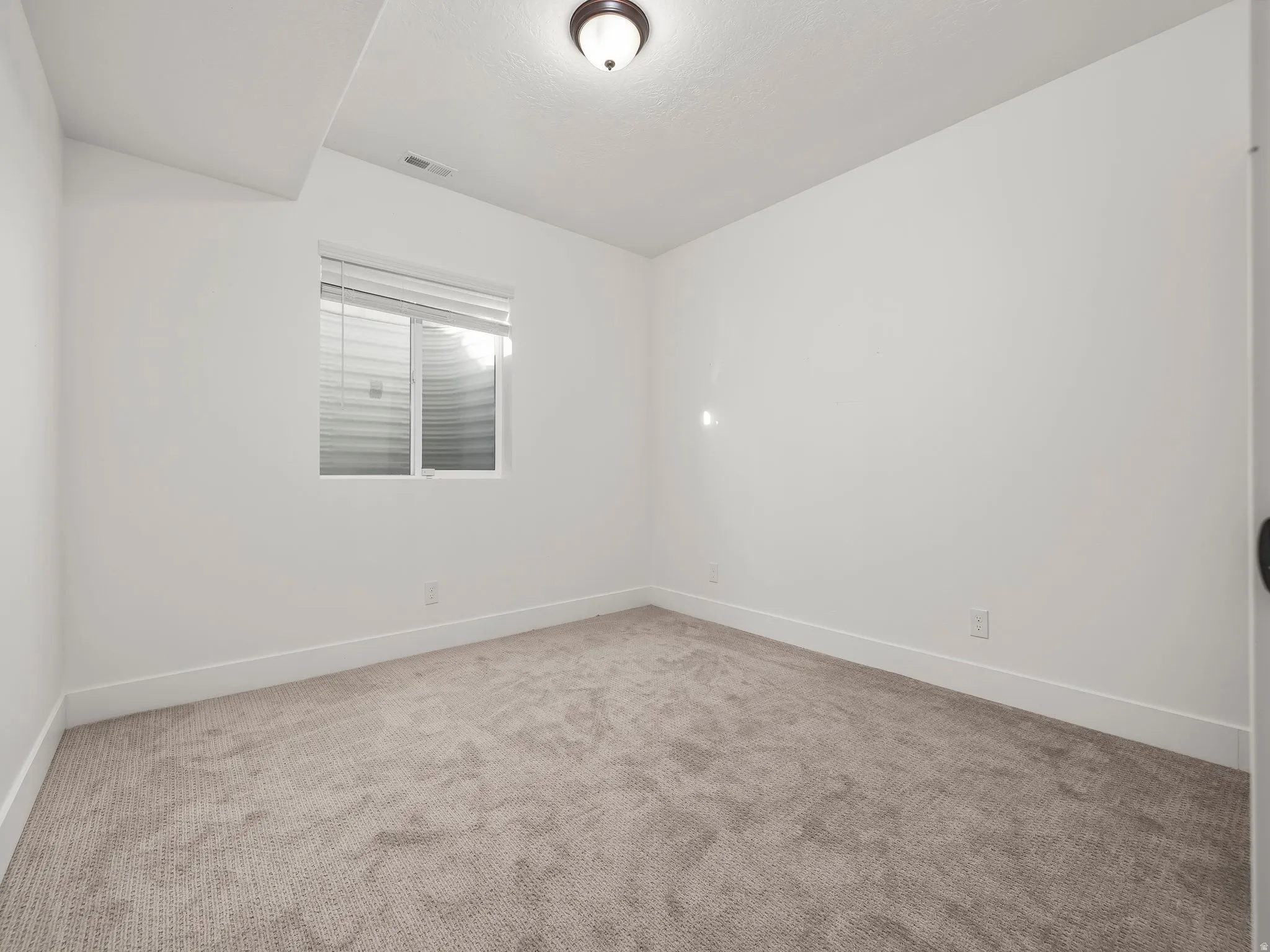Spare room with carpet