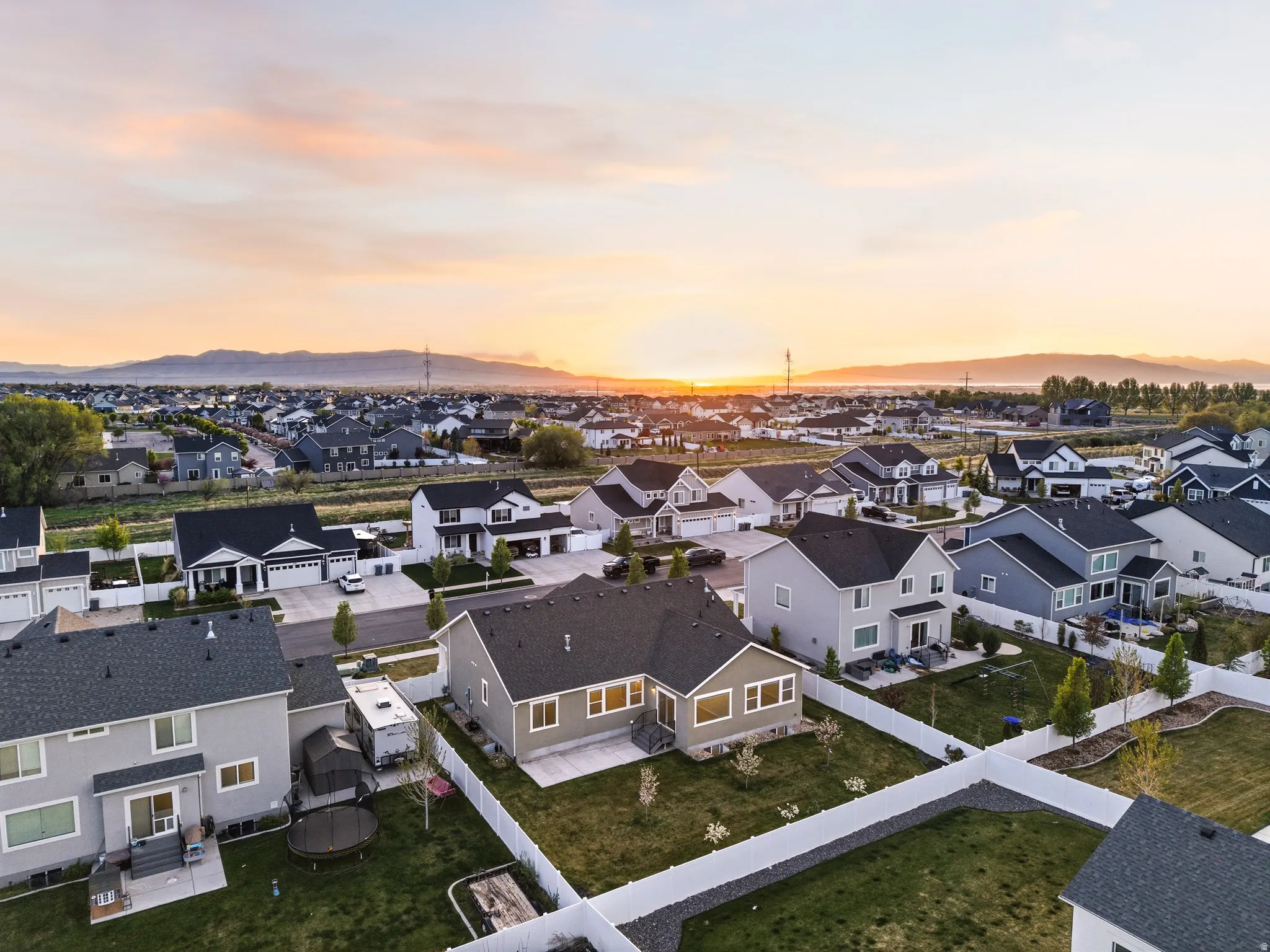 Aerial view of residential area with a mountainous background