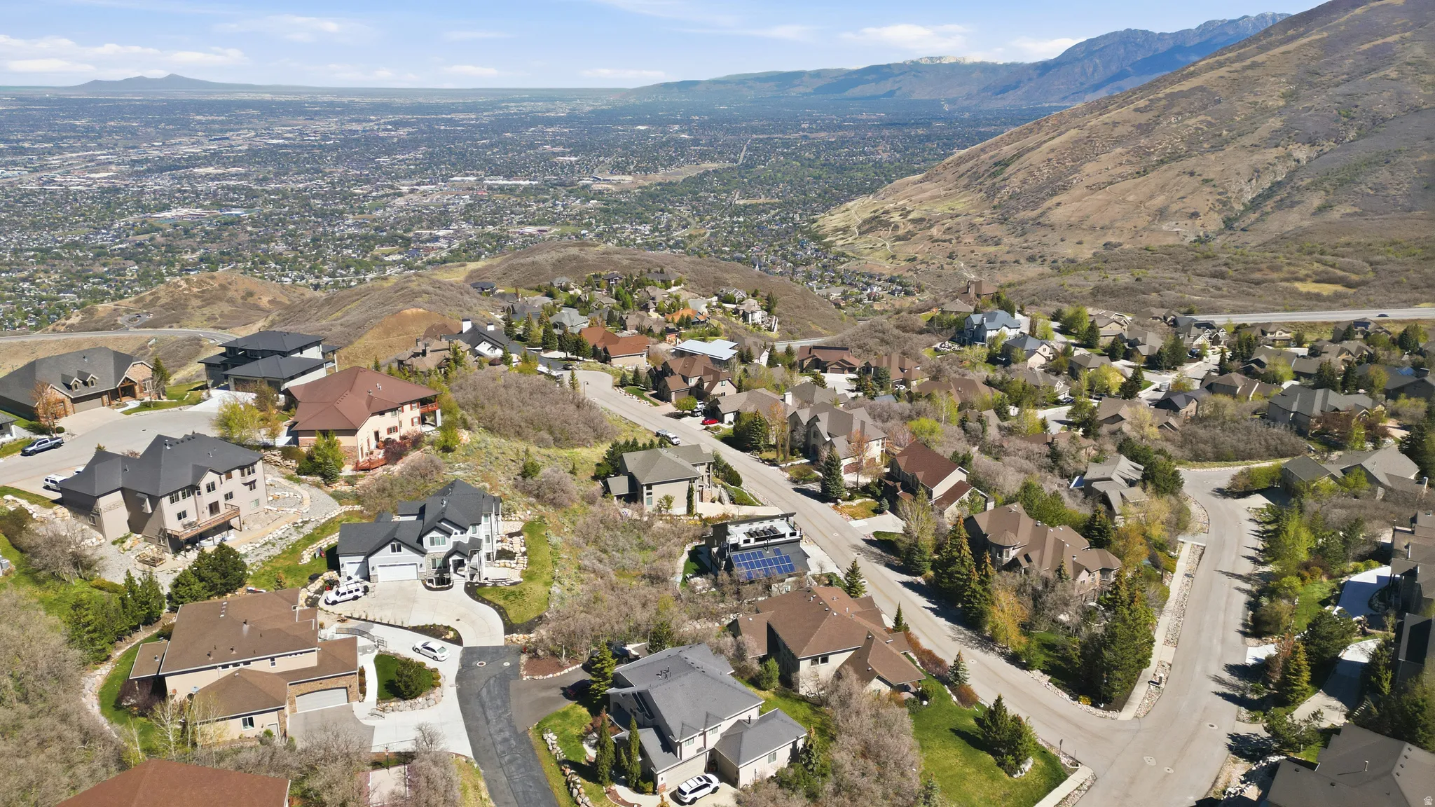 Aerial view of residential area with a mountain backdrop
