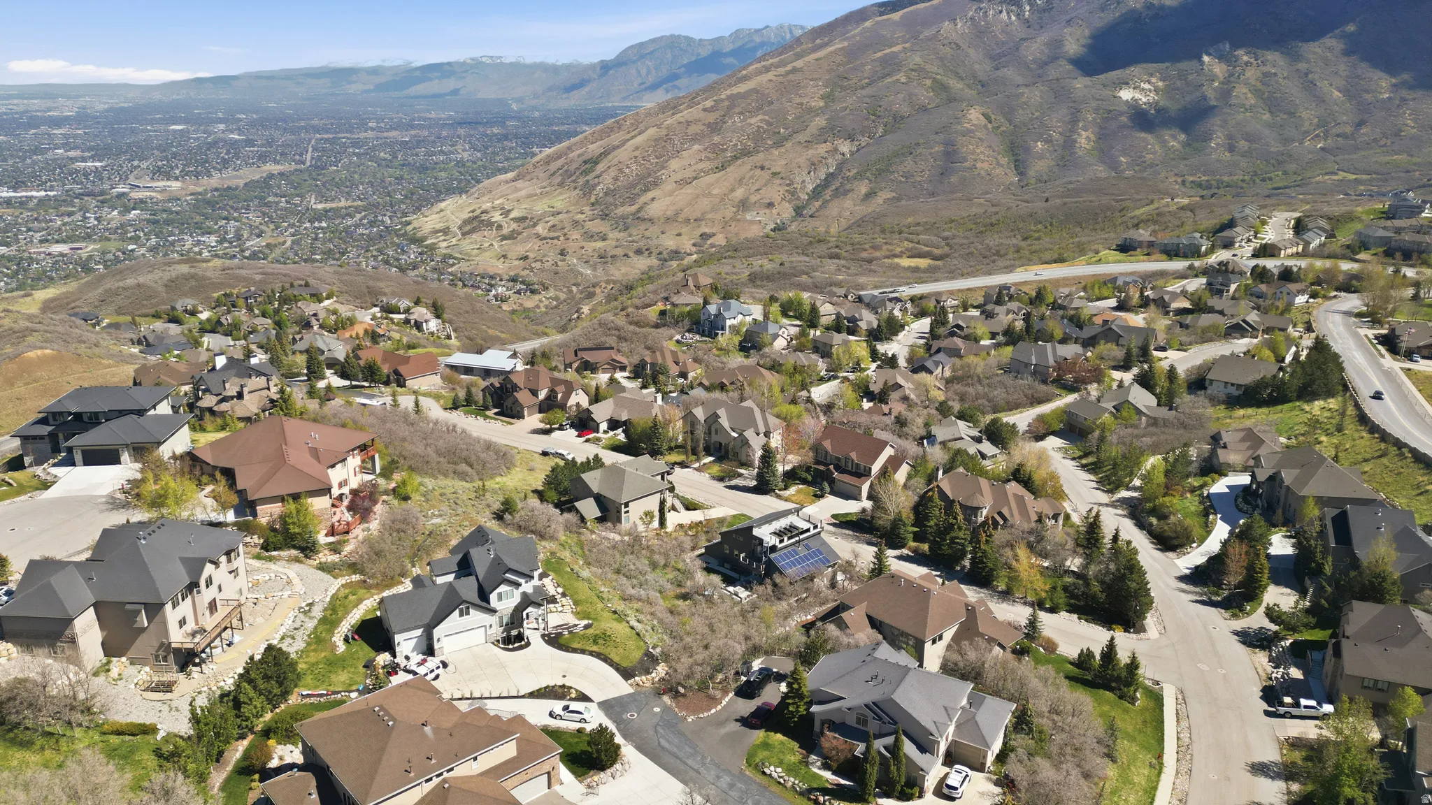 Aerial view of residential area with mountains