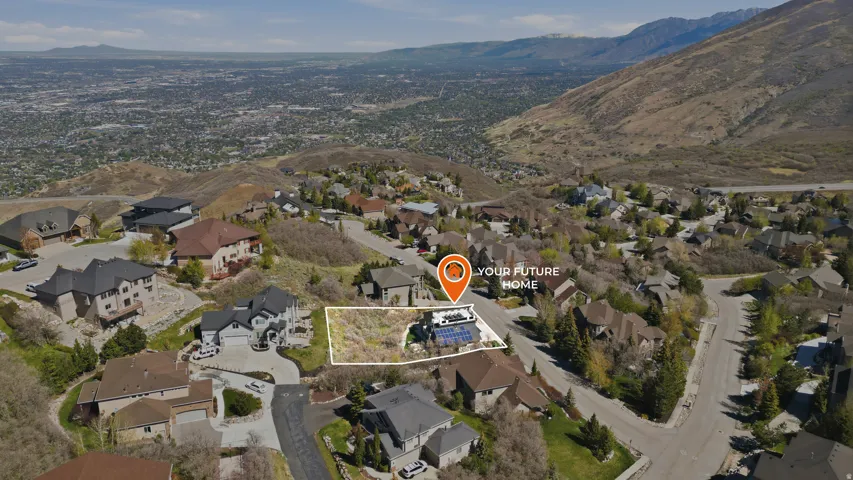 Aerial perspective of suburban area with mountains