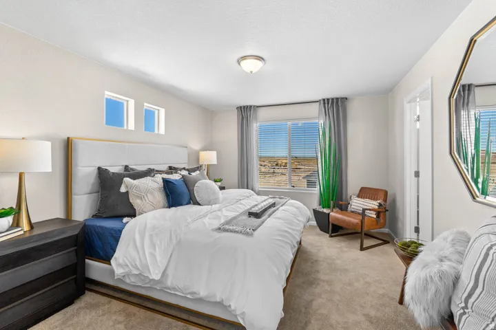 Carpeted bedroom with a textured ceiling