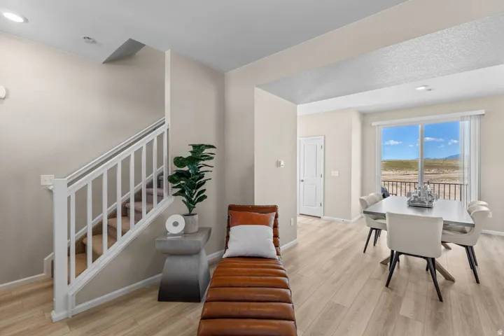 Dining space featuring light wood-type flooring and recessed lighting