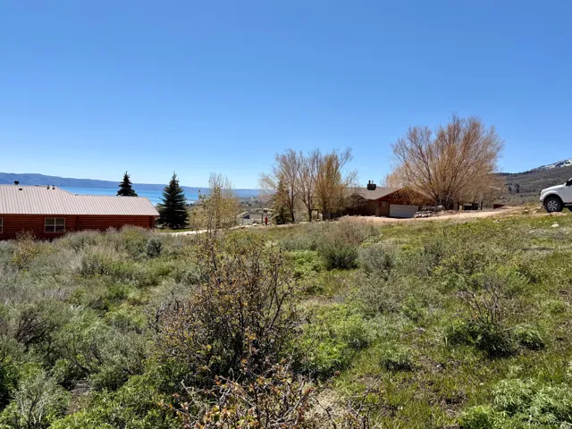 View of yard featuring a mountain view and a view of rural / pastoral area