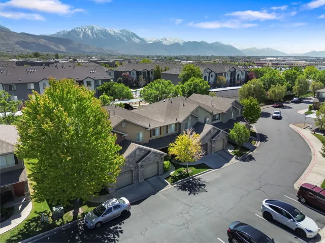 Aerial view of residential area featuring a mountain backdrop