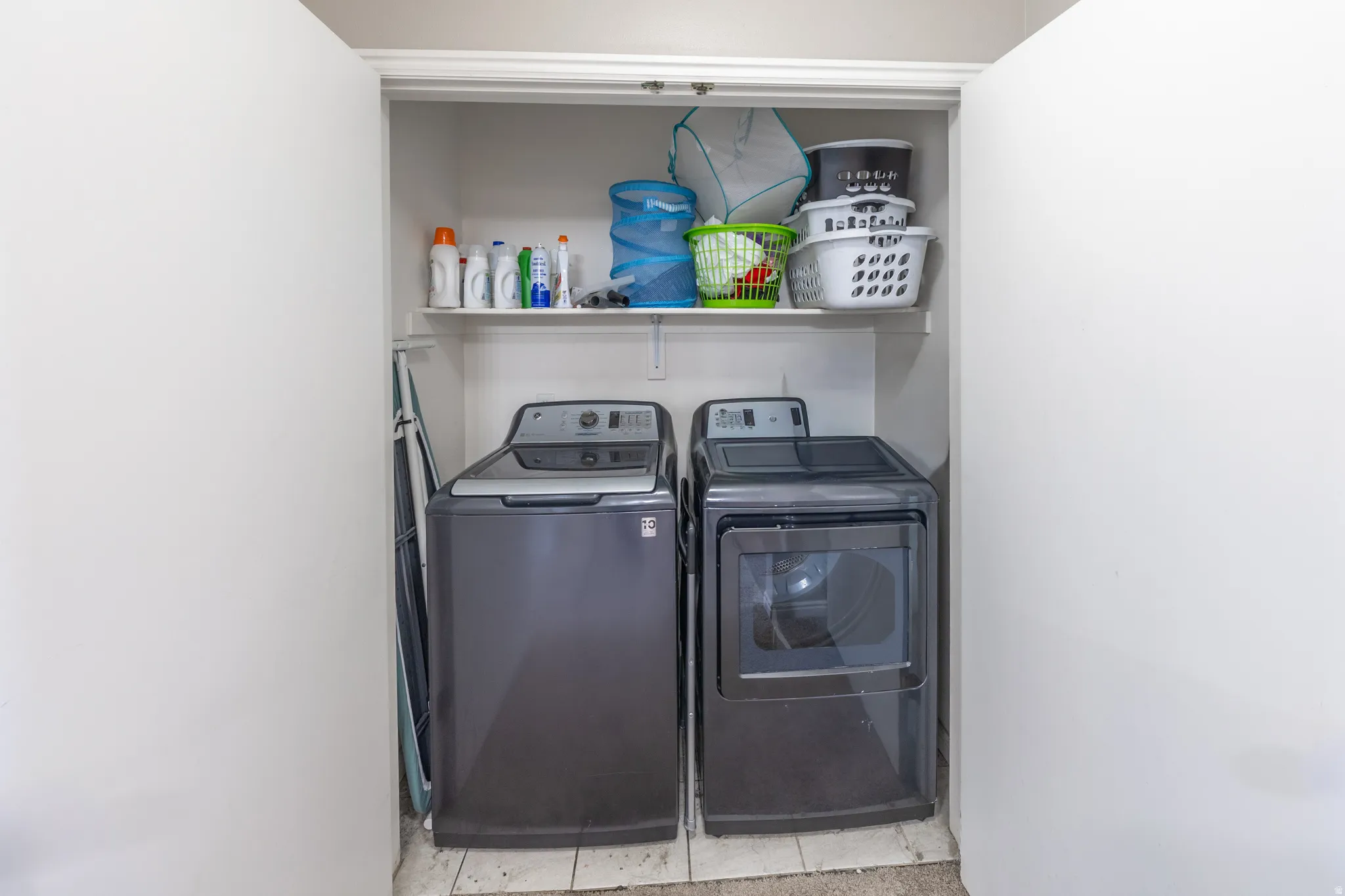 Laundry area with separate washer and dryer