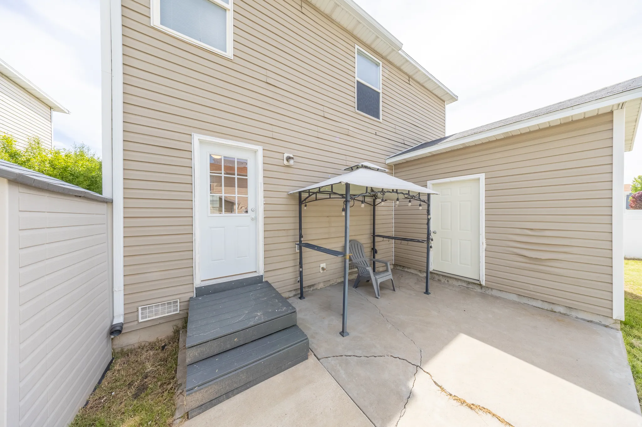 View of patio featuring a gazebo