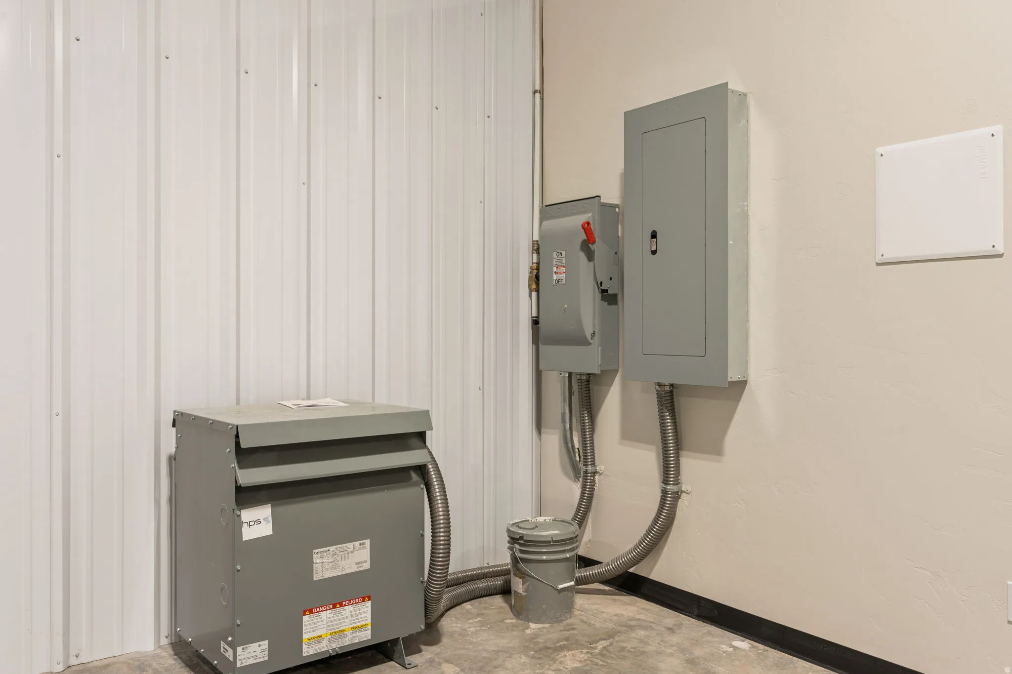 Utility room featuring electric panel