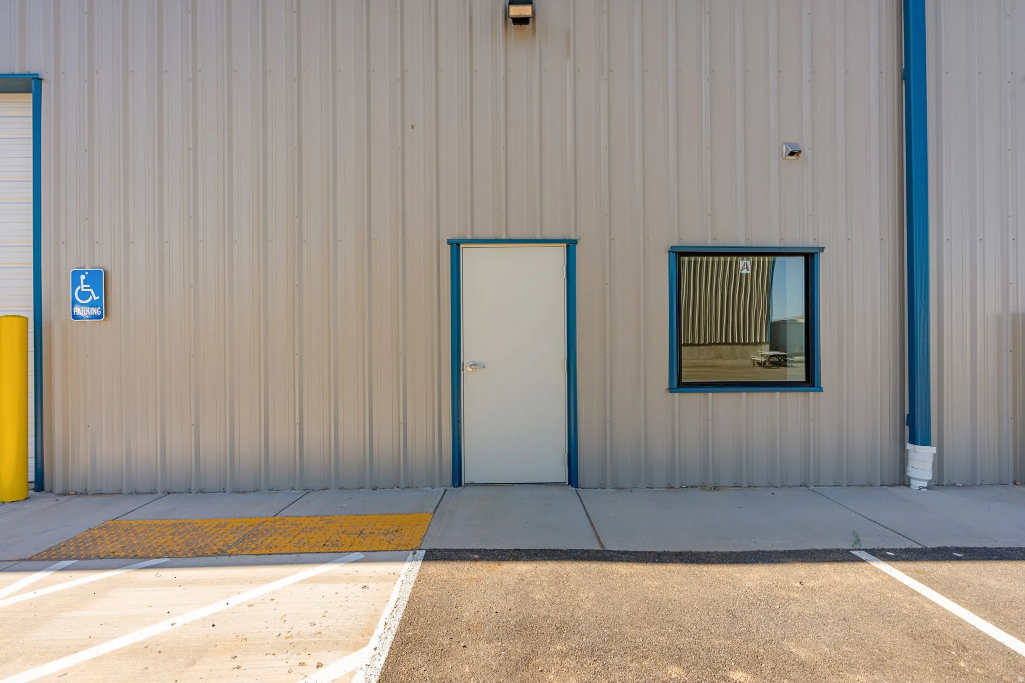 View of exterior entry with board and batten siding