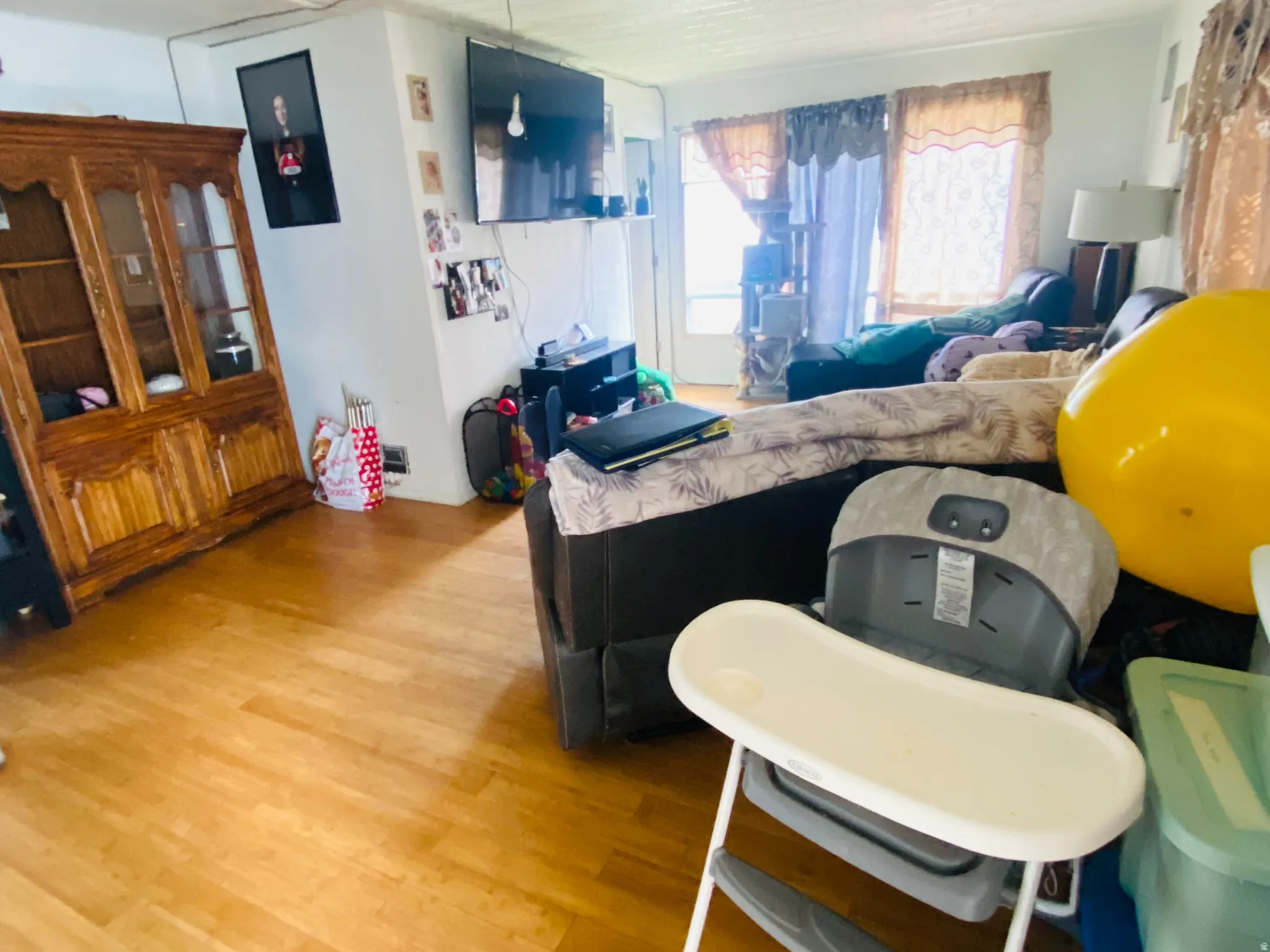 Living room featuring light wood-style flooring
