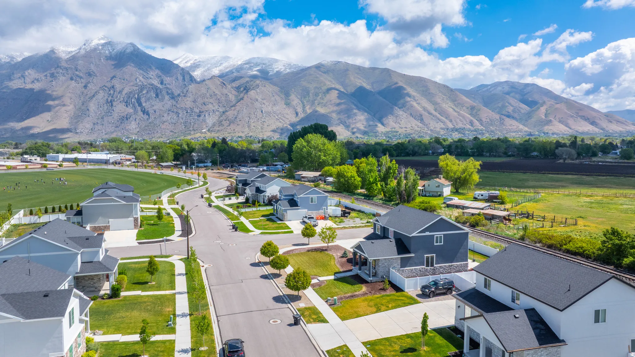 Aerial view of residential area with a mountainous background