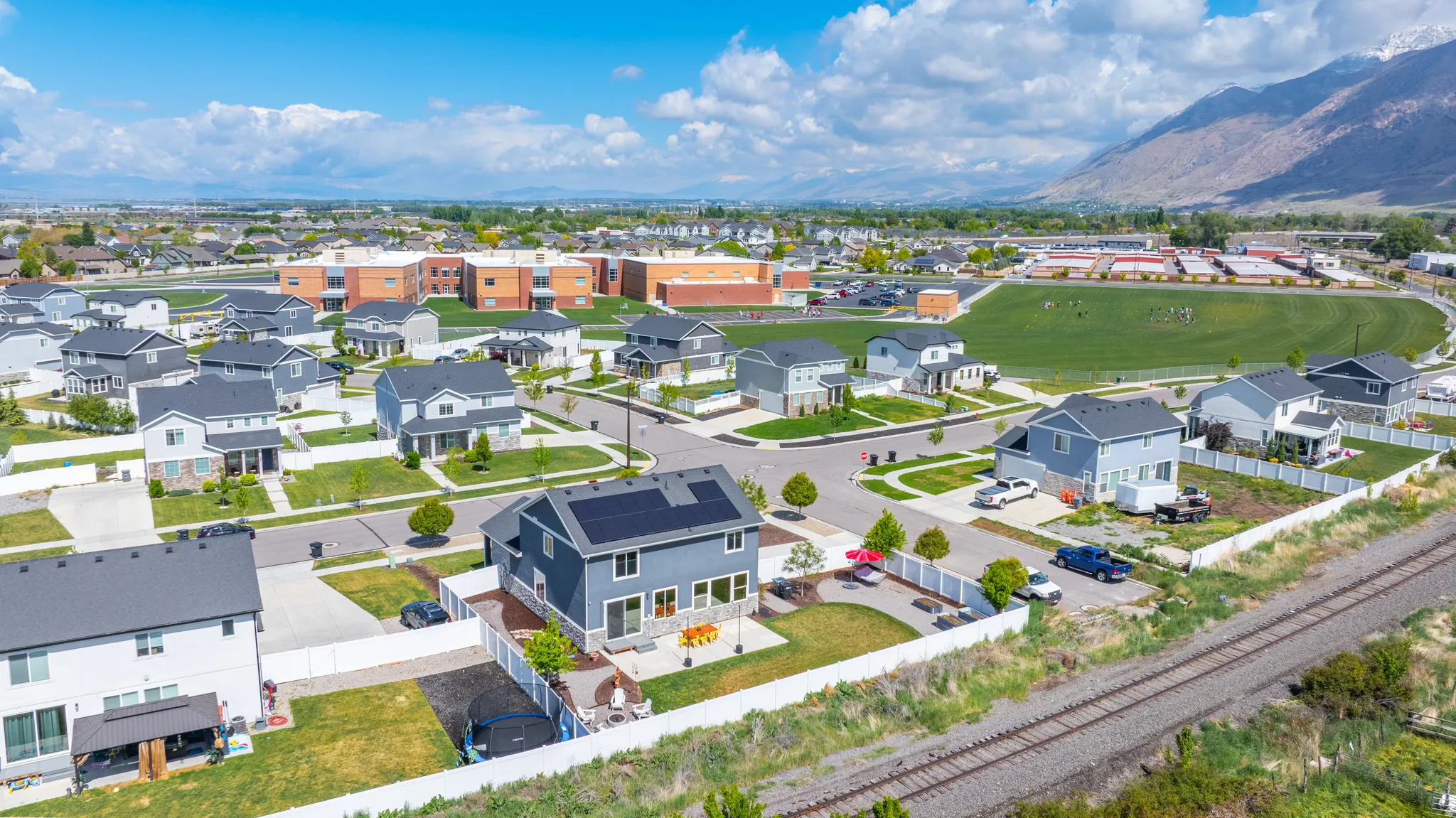 Aerial perspective of suburban area featuring mountains