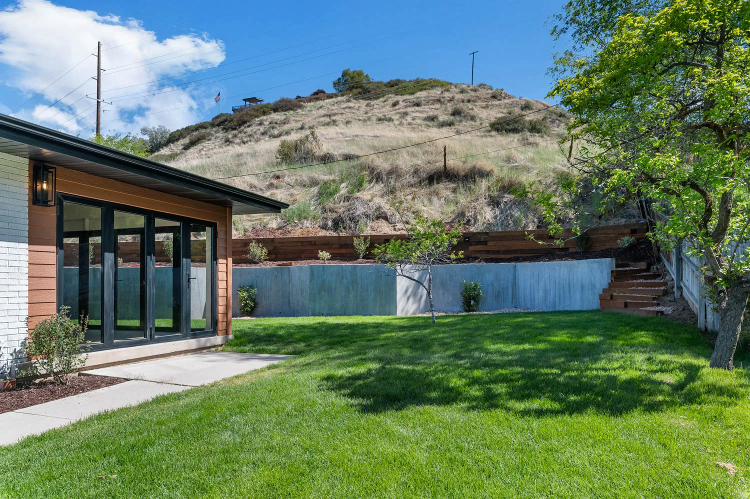View of fenced backyard