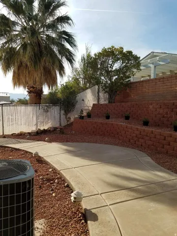 View of fenced backyard