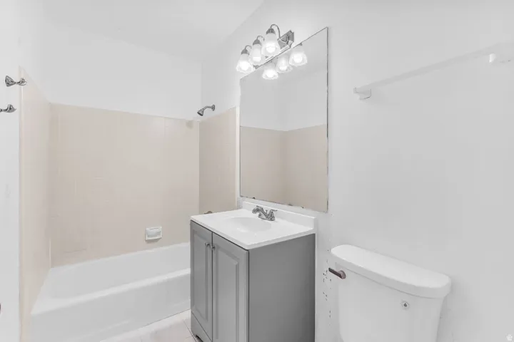 Primary bathroom, full bathroom with shower tub combo.