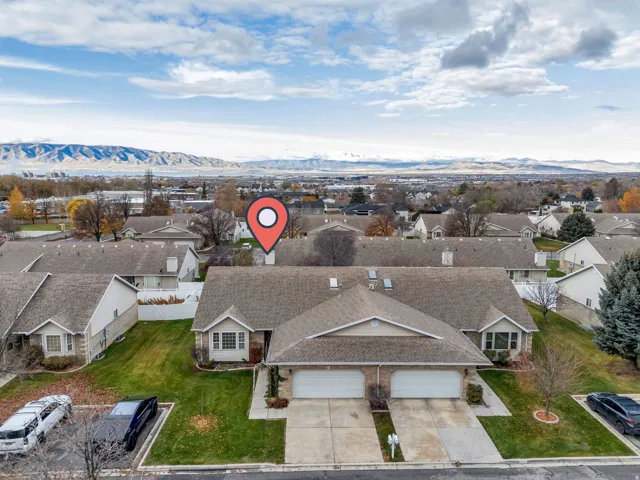 Aerial view of residential area with mountains